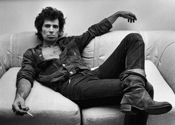 NEW YORK, NY - 1980:  Guitarist Keith Richards of the Rolling Stones, lounges in his New York City, New York, office during a