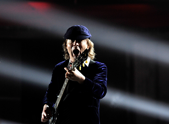 LOS ANGELES, CA - FEBRUARY 08:  Guitarist Angus Young of AC DC performs onstage during The 57th Annual GRAMMY Awards at th...