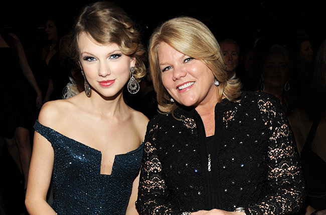 LOS ANGELES, CA - JANUARY 31:  Taylor Swift and her mother attends the 52nd Annual GRAMMY Awards held at Staples Center on...
