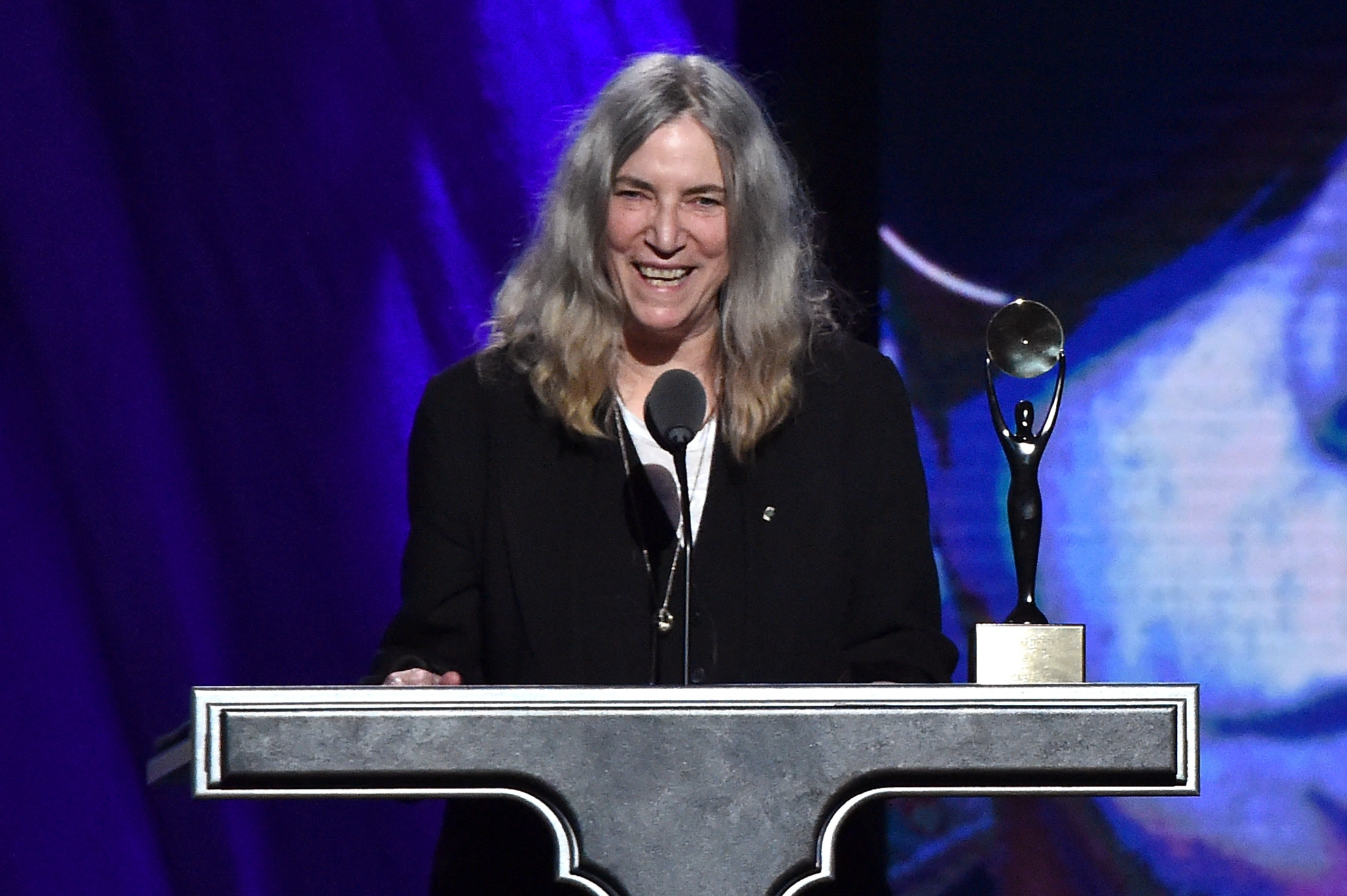 CLEVELAND, OH - APRIL 18:  Patti Smith inducts Lou Reed onstage during the 30th Annual Rock And Roll Hall Of Fame Inductio...