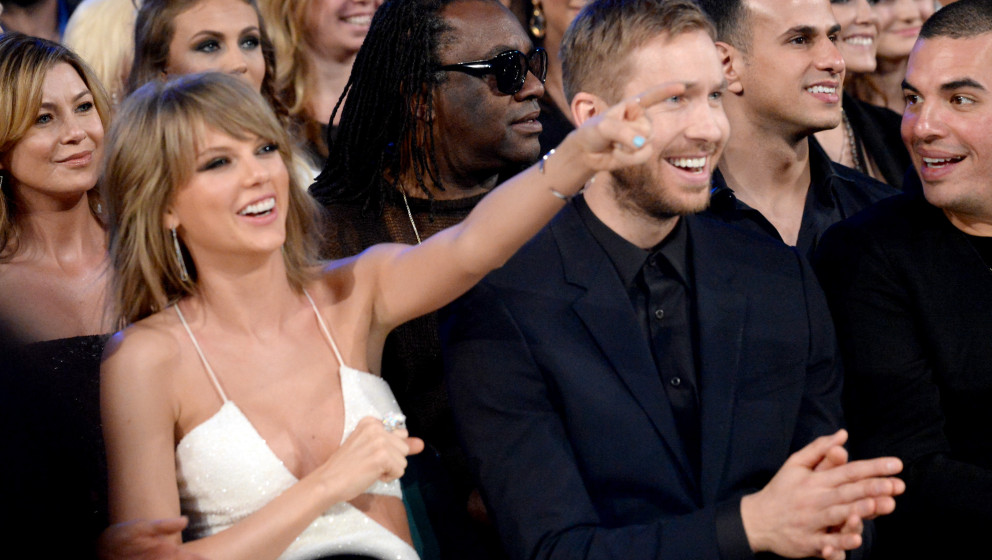 LAS VEGAS, NV - MAY 17:  Singer Taylor Swift (L) and DJ Calvin Harris attend the 2015 Billboard Music Awards at MGM Grand Gar
