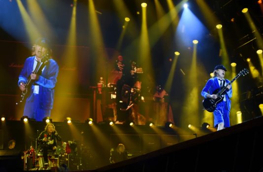 Australian rock band AC/DC's guitarist Angus Young (R) and US singer Axl Rose (L) perform on stage in Marseille on May 13, 2016. / AFP / BORIS HORVAT (Photo credit should read BORIS HORVAT/AFP/Getty Images)