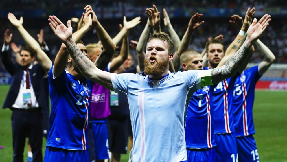 (FILE) Aron Gunnarsson (front) of Iceland and his teammates celebrate after the UEFA EURO 2016 round of 16 match between Engl