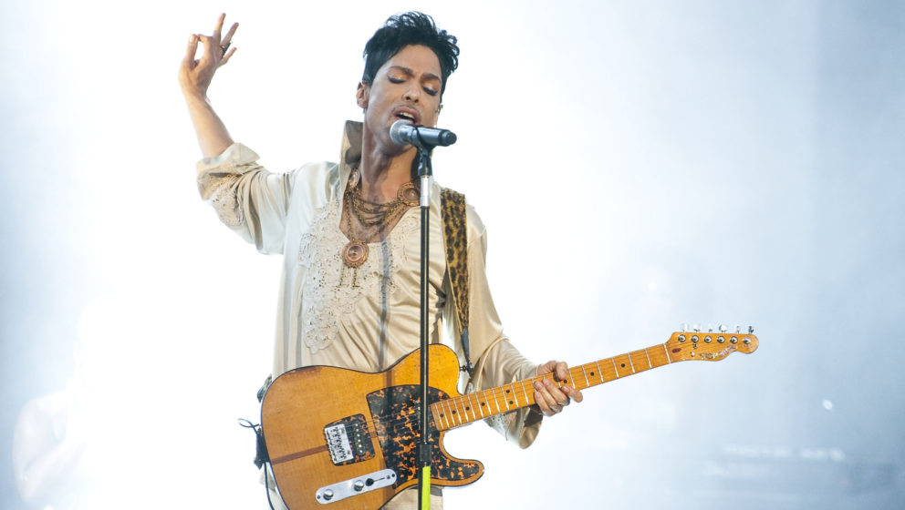 PADDOCK WOOD, UNITED KINGDOM - JULY 03: Prince headlines the main stage on the last day of Hop Farm Festival on July 3, 2011 