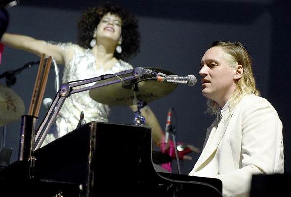 NEW ORLEANS, LA - OCTOBER 30:  Regine Chassagne (L) and Win Butler of Arcade Fire perform during the Voodoo Music + Arts Expe