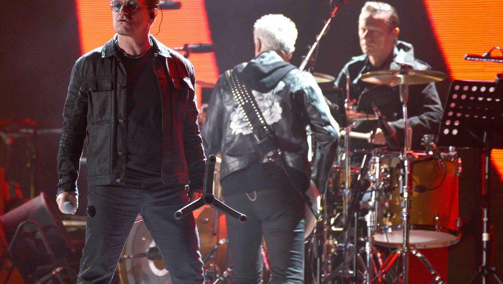 SAN FRANCISCO, CA - OCTOBER 05:  Bono, Adam Clayton and Larry Mullen Jr.  of U2 perform during the 2016 UCSF Benioff Children