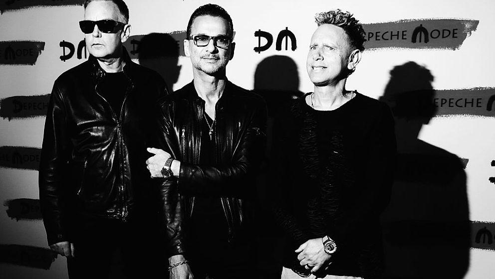 MILAN, ITALY - OCTOBER 11:  (EDITORS NOTE: Image has been converted to black and white.) Depeche Mode attend a photocall to l