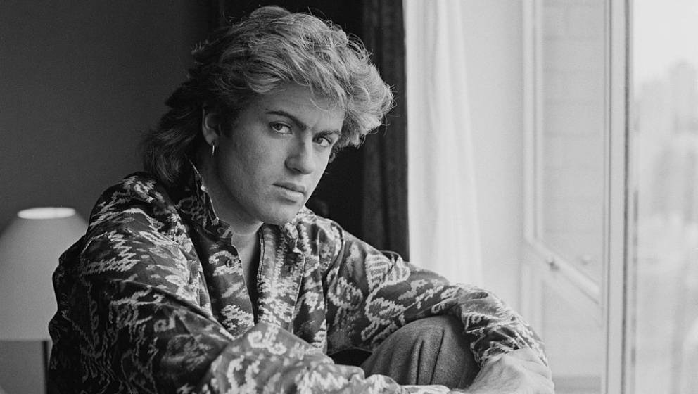 British singer-songwriter George Michael, of Wham!, in a Sydney hotel room during the pop duo's 1985 world tour, January 1985
