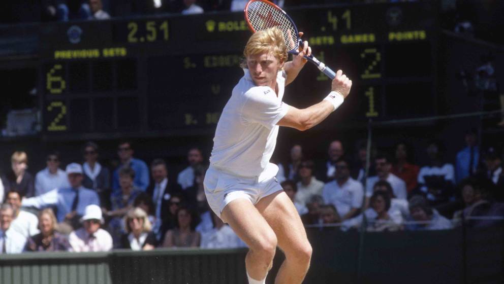 LONDON - CIRCA 1990:  Boris Becker of West Germany hits a return during a men's singles match at the Wimbledon Lawn Tennis Ch