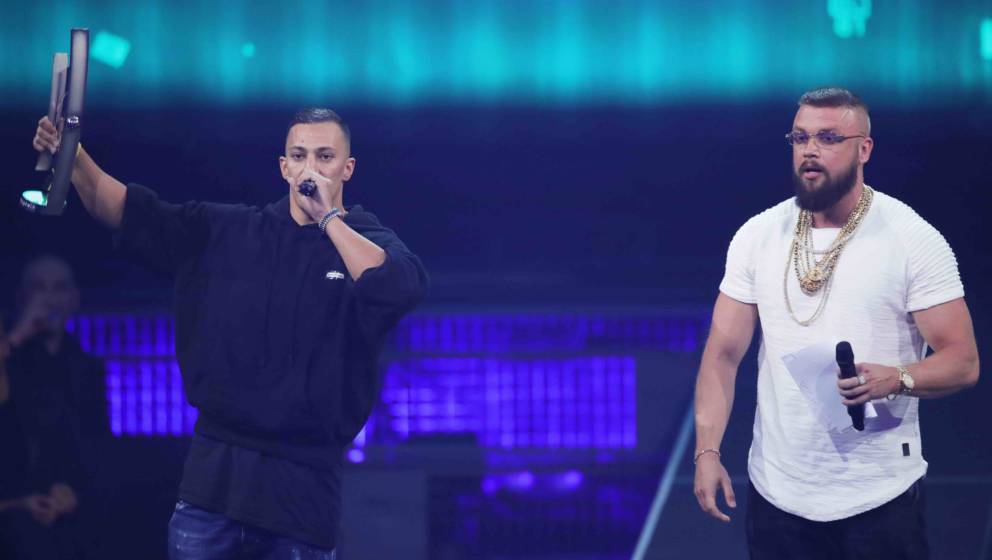 BERLIN, GERMANY - APRIL 12:  'Hip-Hop/Urban - National' award winners Farid Bang and Kollegah speak on stage during the Echo 