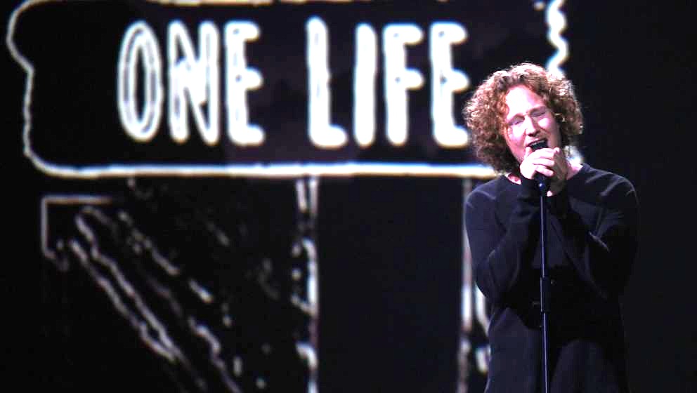 Germany's singer and songwriter Michael Schulte performs 'You let me walk alone' during the final of the 63rd edition of the 