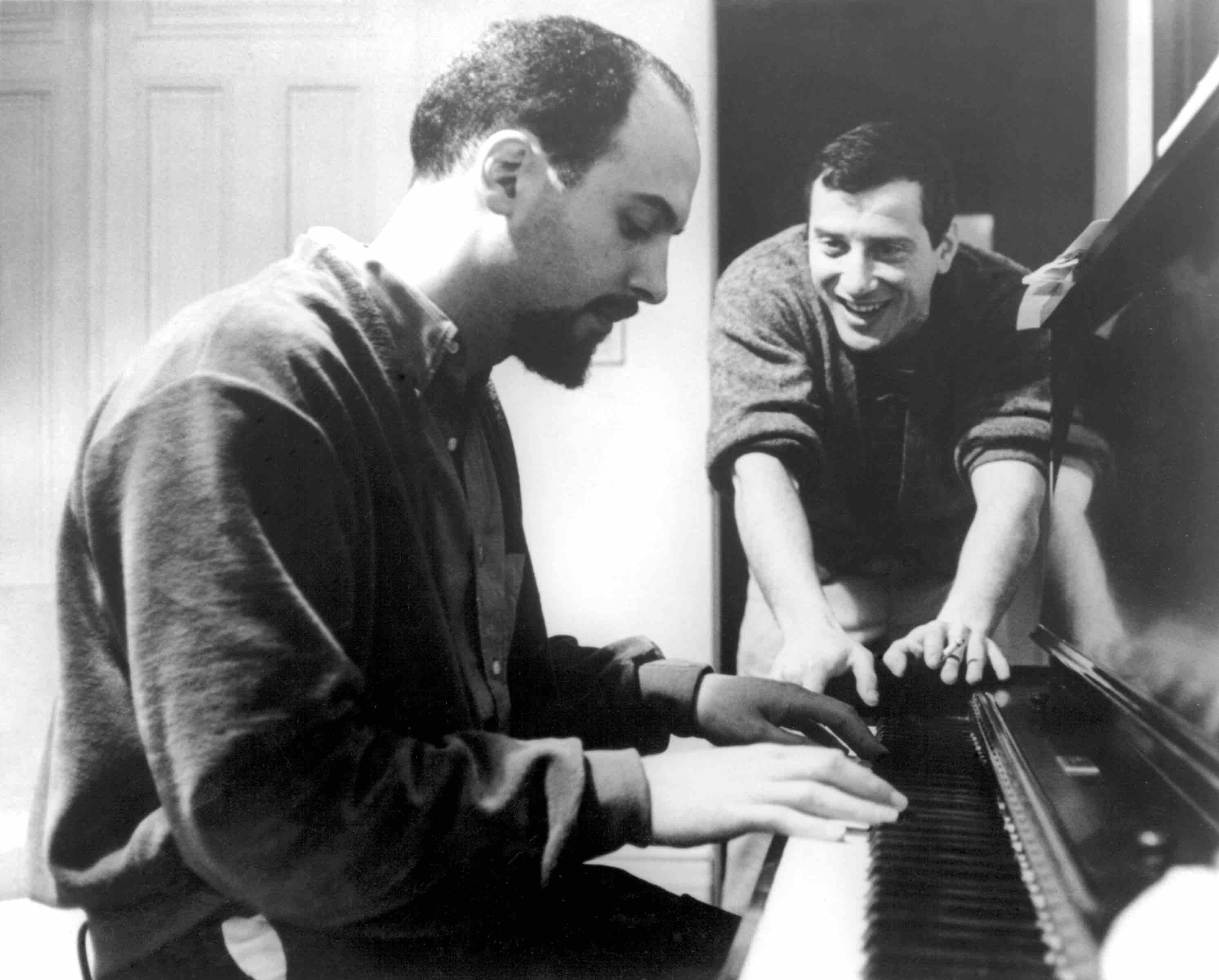 NEW YORK - CIRCA 1956:  Jerry Leiber (right) and Mike Stoller work out a tune on an upright piano in circa 1956 in New Yor...