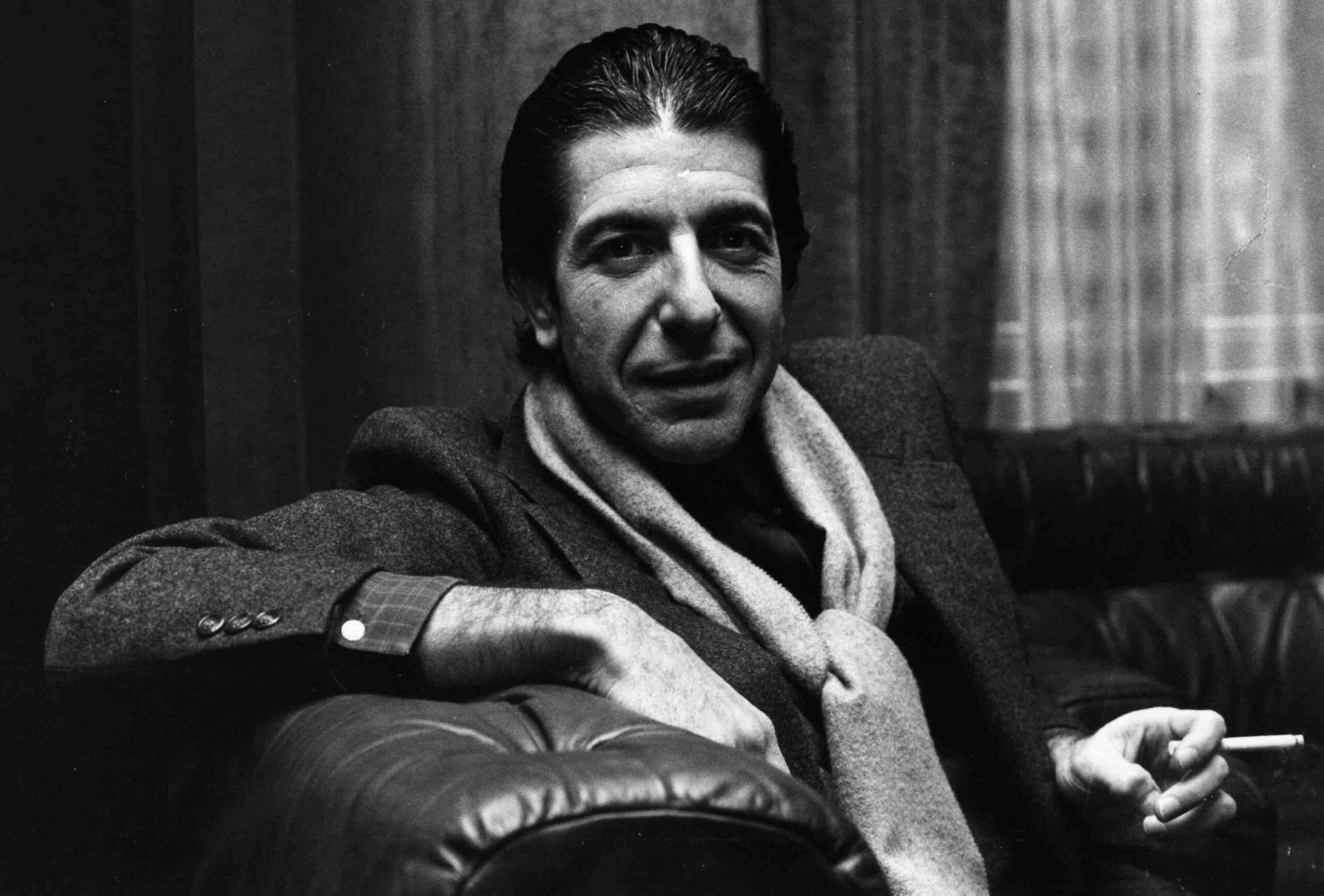 8th January 1980:  Solemn Canadian folk pop singer-songwriter Leonard Cohen shares a joke and smokes a cigarette.  (Photo ...