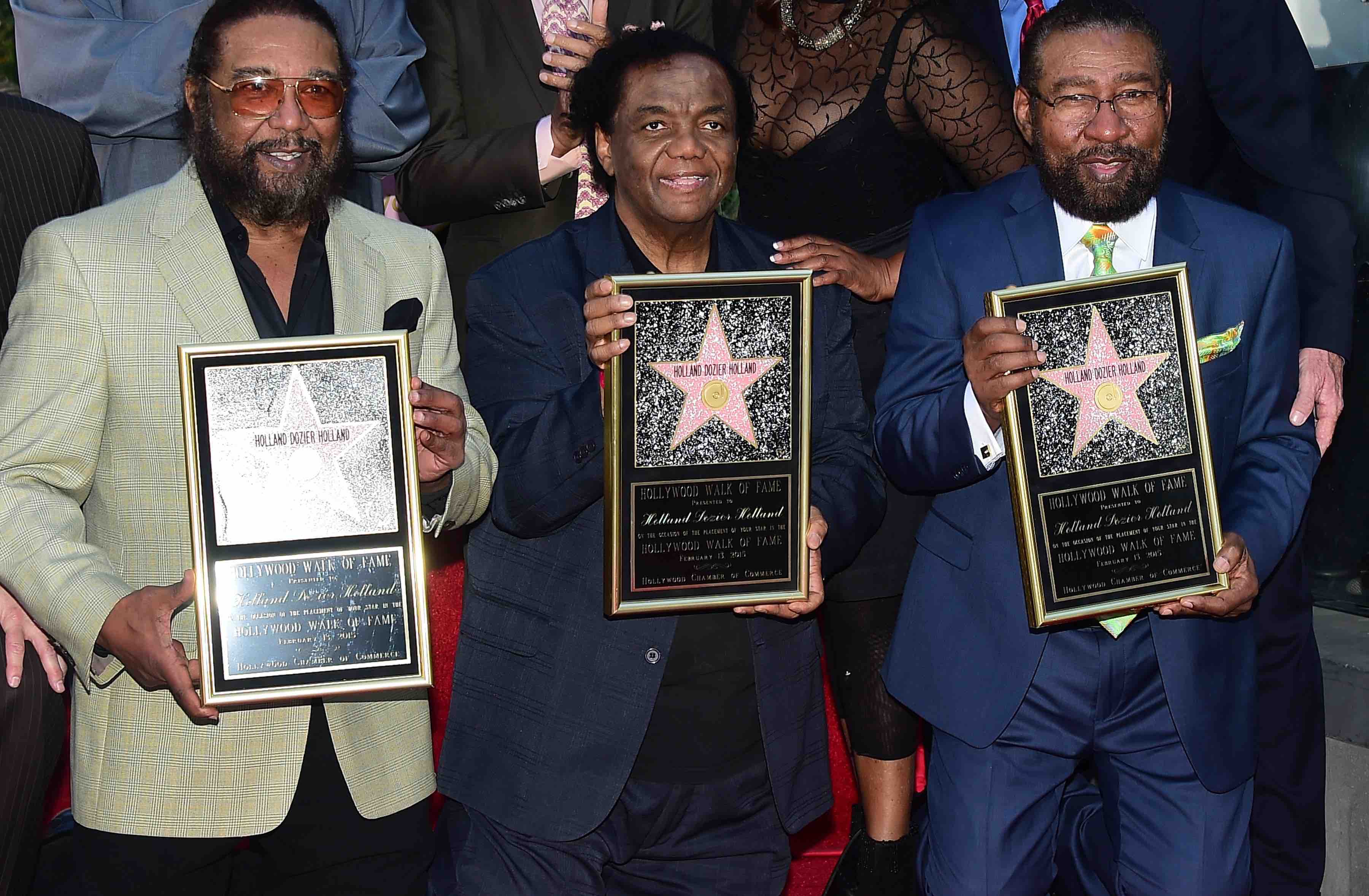 Songwriters Eddie Holland (L), Lamont Dozier (C) and Brian Holland (R) pose during their Hollywood Walk of Fame Star cerem...