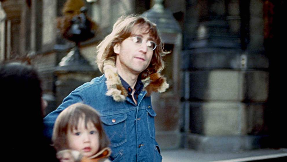 NEW YORK - 1977: Former Beatle John Lennon poses for a photo with his wife Yoko Ono and son Sean Lennon in 1977 in New York C
