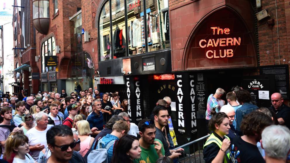 LIVERPOOL, ENGLAND - JULY 26:  Fans of Paul McCartney make their way inside The Cavern Club, as the singer plays a one off gi