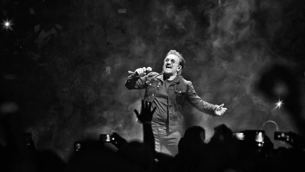 BERLIN, GERMANY - AUGUST 31: (EDITORS NOTE: Image has been converted to black and white.) Singer Bono of the Irish band U2 pe