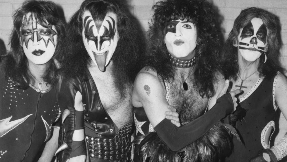 10th May 1976:  American rock group Kiss arrive at London airport for their first European tour, already sporting black and s