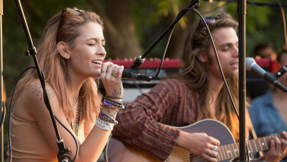 LOS ANGELES, CA - AUGUST 11:  Paris Jackson (L) and Gabriel Glenn of The Soundflowers perform at Canyon Sessions presents a f