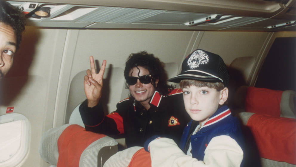 UNSPECIFIED - JULY 11: Michael Jackson with 10 year old Jimmy Safechuck on the tour plane on 11th of July 1988. (Photo by Dav