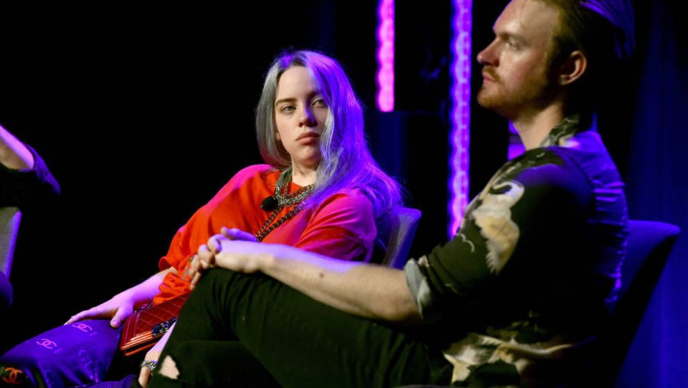 HOLLYWOOD, CA - MAY 08:  (L-R) Singer/Songwriter Billie Eilish and Producer Finneas O'Connell speak onstage at the 'Billie Ei