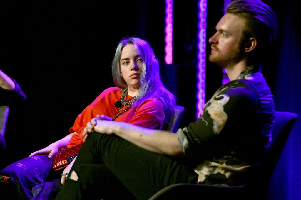 HOLLYWOOD, CA - MAY 08:  (L-R) Singer/Songwriter Billie Eilish and Producer Finneas O'Connell speak onstage at the 'Billie...