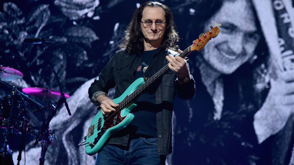 NEW YORK, NY - APRIL 07:  2013 Inductee Geddy Lee of RUSH performs with Yes onstage at the 32nd Annual Rock & Roll Hall O
