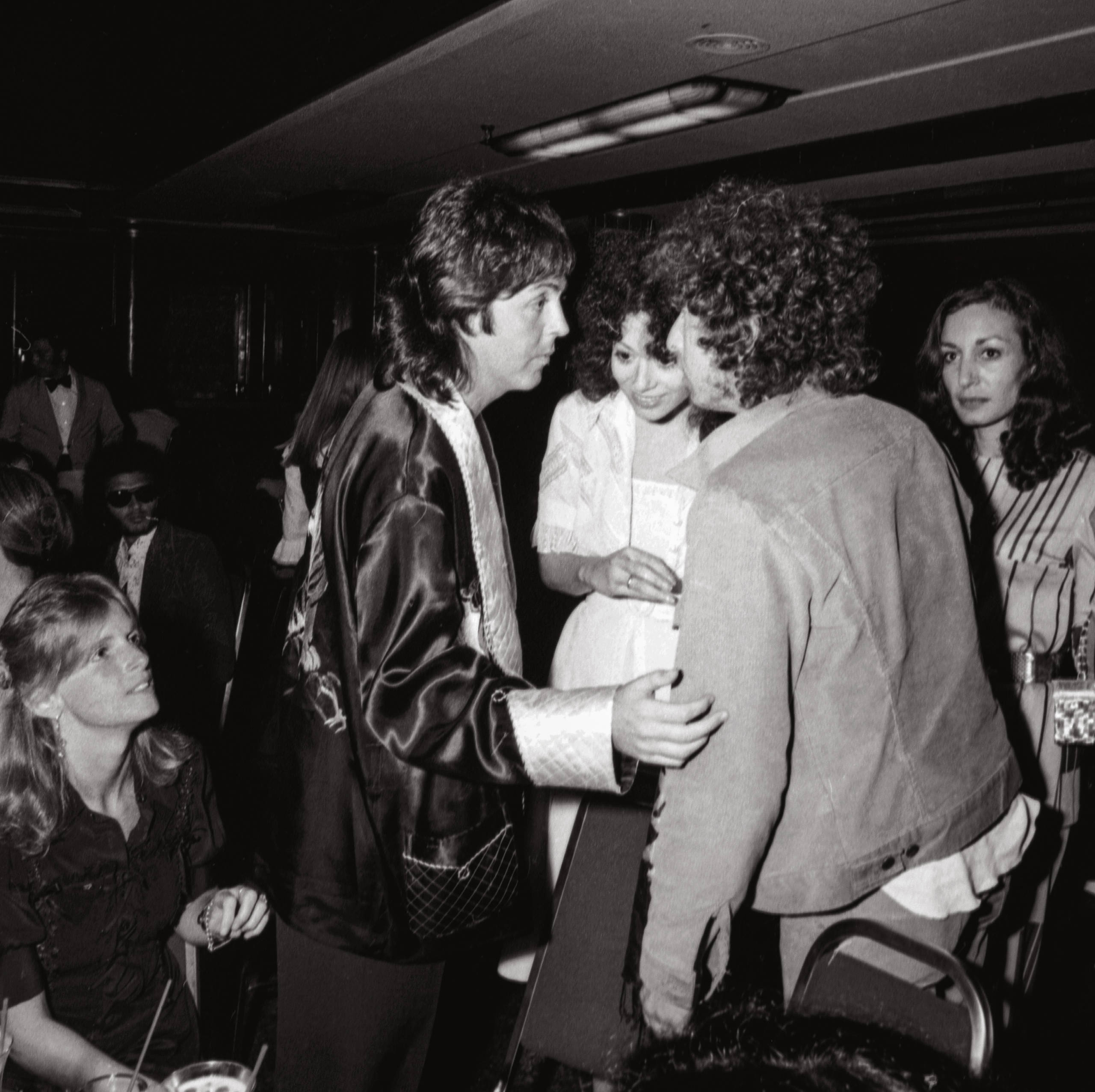 Paul talks to Bob Dylan on board the Queen Mary, at the launch party for the Wings’ record Venus and Mars. Long Beach, C...
