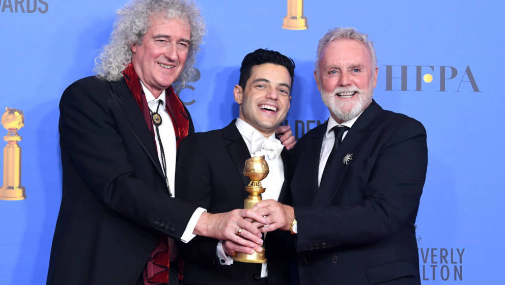 Haben gut zu lachen: Queens Brian May und Roger Taylor mit Oscar und Golden Globe-Gewinner Rami Malek. 2019.