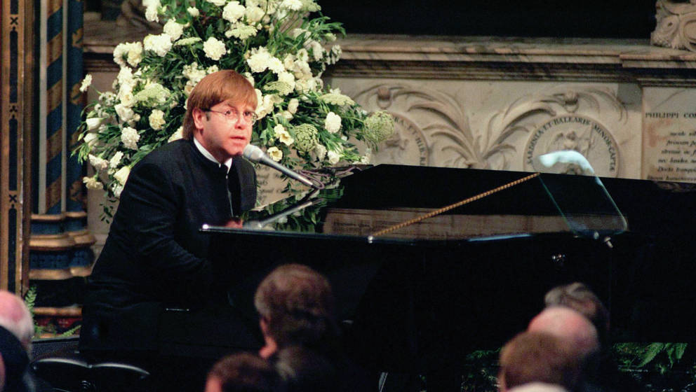 LONDON - SEPTEMBER 6:  Sir Elton John sings 'Candle in the Wind' at the funeral if Diana, Princess of Wales at Westminster Ab