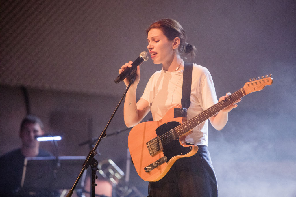 BERLIN, GERMANY - APRIL 13: Anja Plaschg of Soap & Skin performs live on stage during a concert at the Universitaet der Ku...