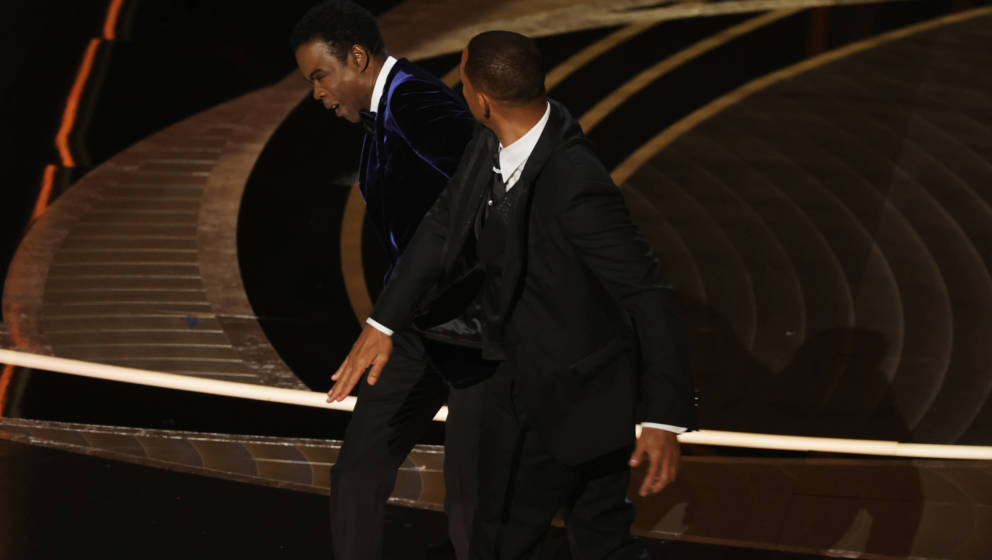 HOLLYWOOD, CALIFORNIA - MARCH 27: Will Smith appears to slap Chris Rock onstage during the 94th Annual Academy Awards at Dolb
