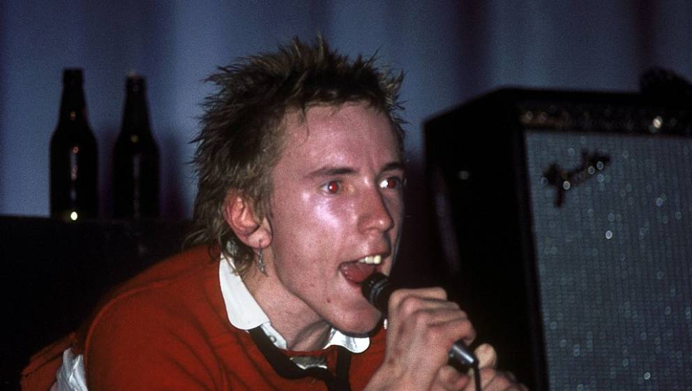 UNITED KINGDOM - OCTOBER 21:  Photo of Johnny ROTTEN and SEX PISTOLS; Johnny Rotten (John Lydon) performing live onstage at D