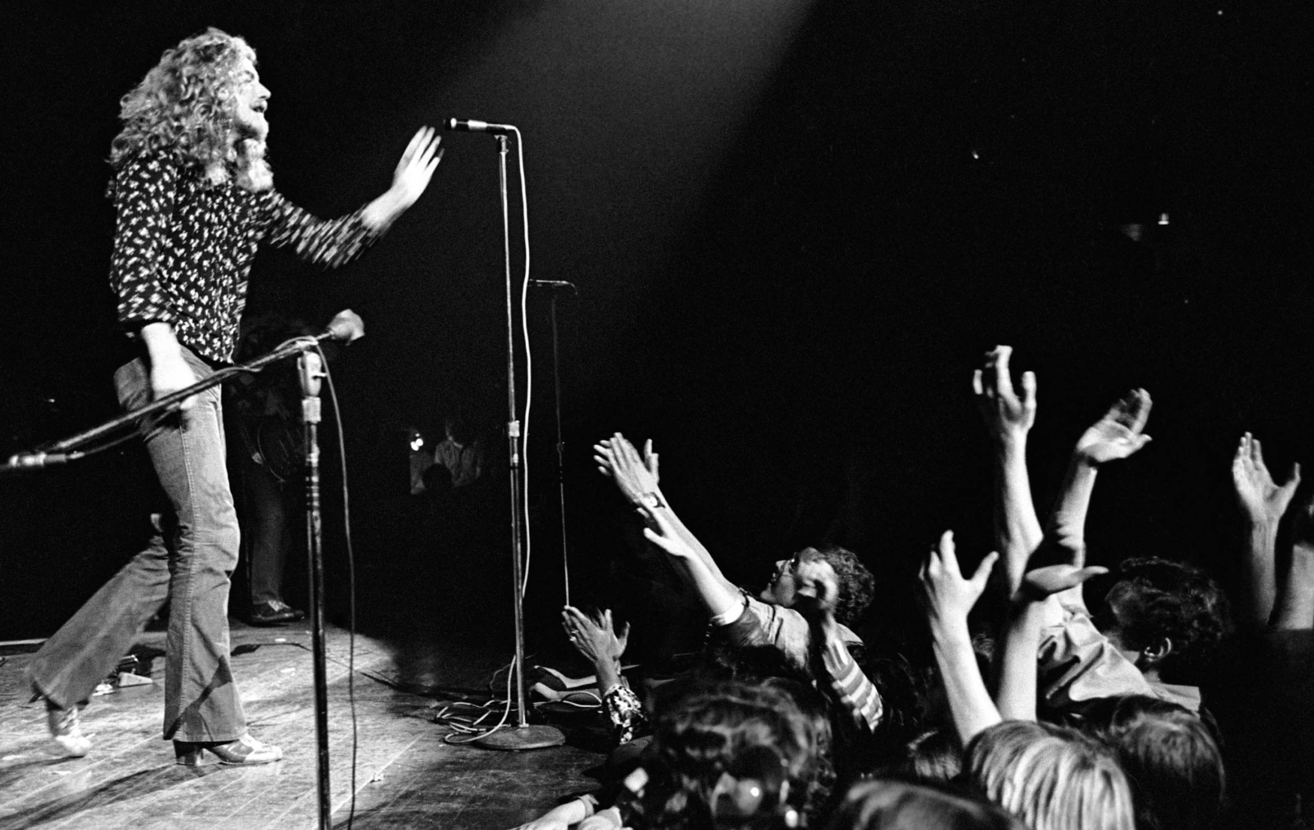 LOS ANGELES - SEPTEMBER 4: Singer Robert Plant of the rock band "Led Zeppelin" performs onstage at the Forum on September ...
