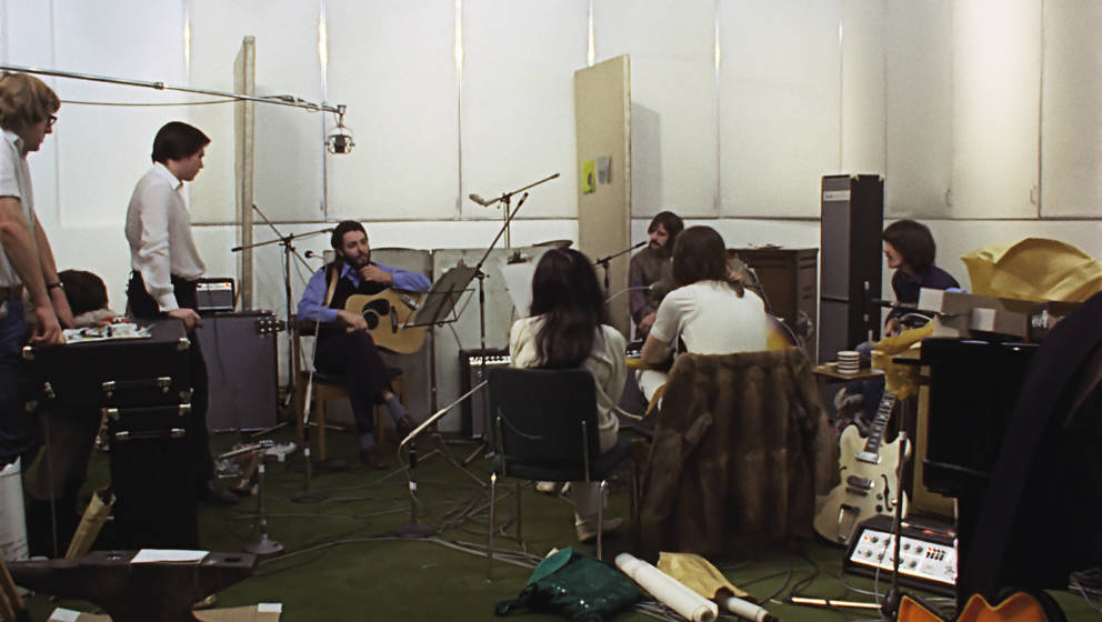 Paul McCartney, Ringo Starr, George Harrison, and John Lennon in THE BEATLES: GET BACK. Photo courtesy of Apple Corps Ltd.