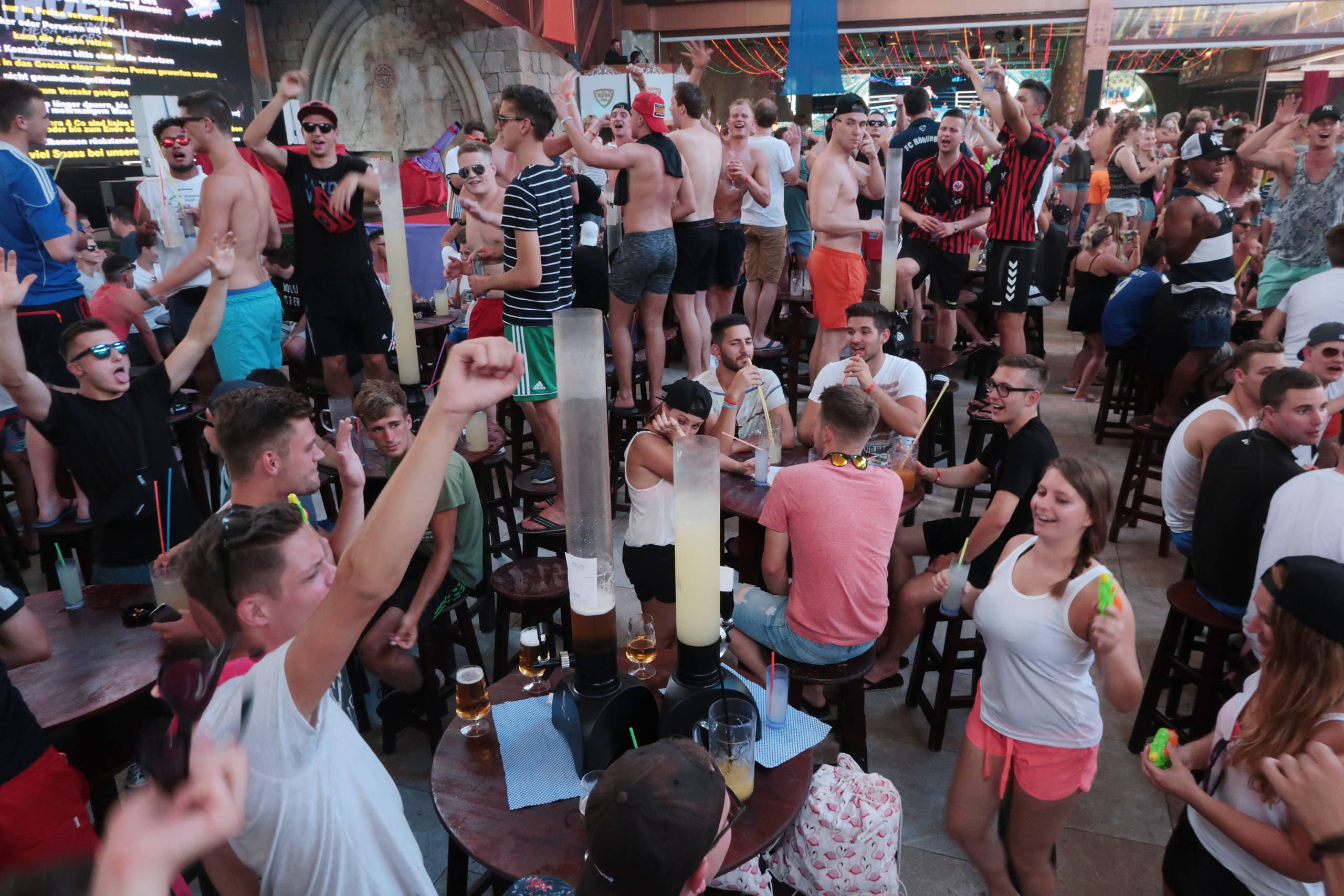 PALMA DE MALLORCA, SPAIN - JULY 27:  Revelers celebrate at the Megapark bar and disco near the Ballermann stretch on July ...