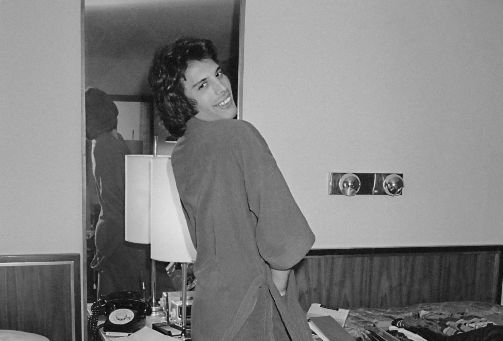 Singer Freddie Mercury (1946 - 1991) of British rock band Queen in a bedroom during a tour, circa 1977. (Photo by Michael ...
