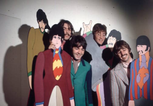 The Beatles posed with cardboard cutouts of their 'Yellow Submarine' characters at TVC animation Studios in London, 6th No...
