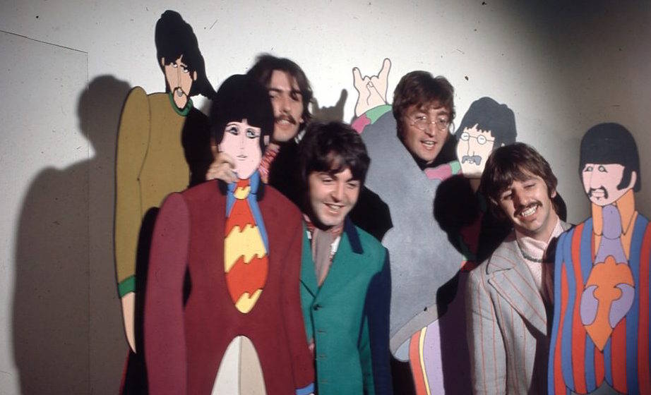 The Beatles posed with cardboard cutouts of their 'Yellow Submarine' characters at TVC animation Studios in London, 6th Novem