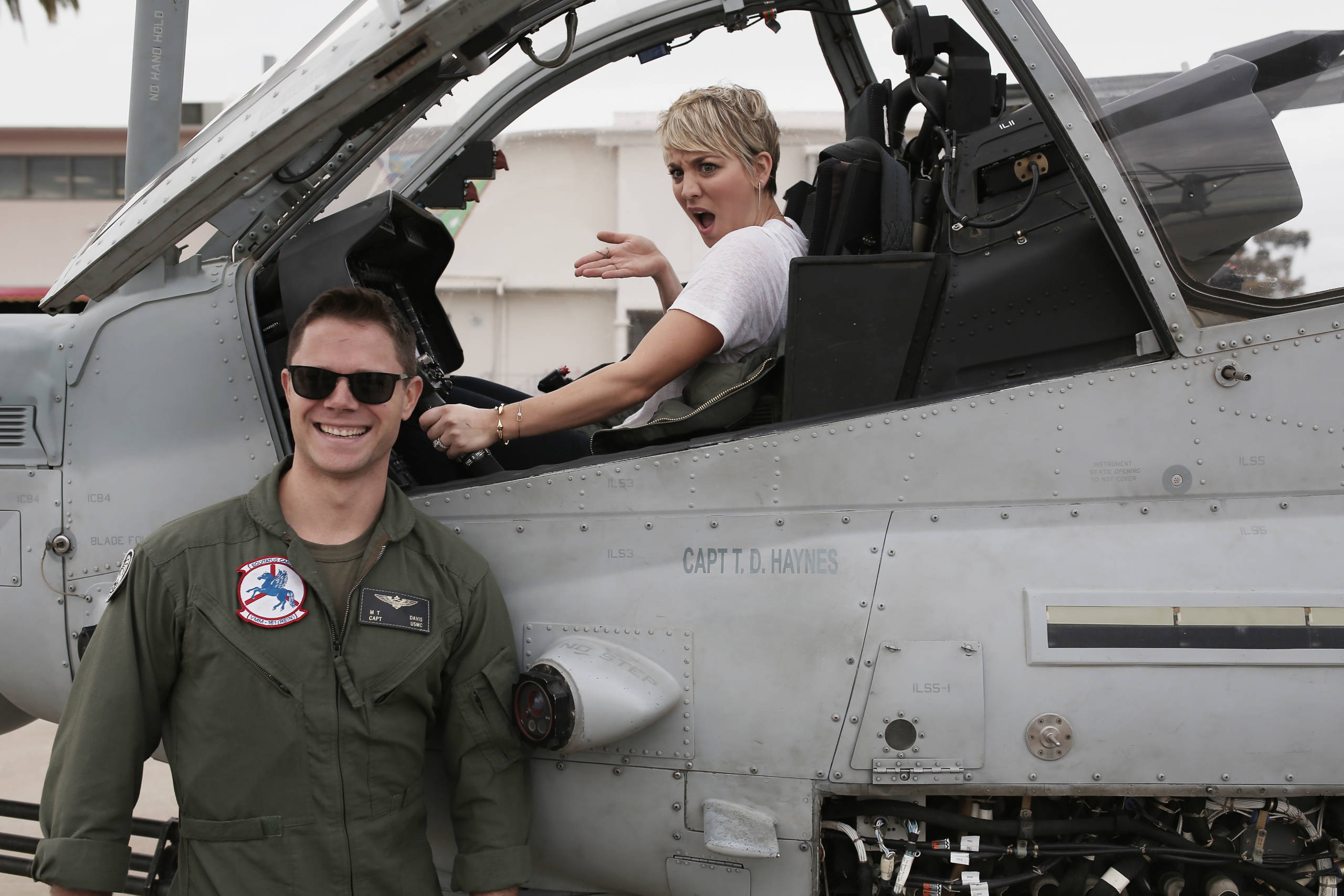 SAN DIEGO, CA - JANUARY 10:  Kaley Cuoco-Sweeting sits in a Marine aircraft during a tour and special screening of Screen ...