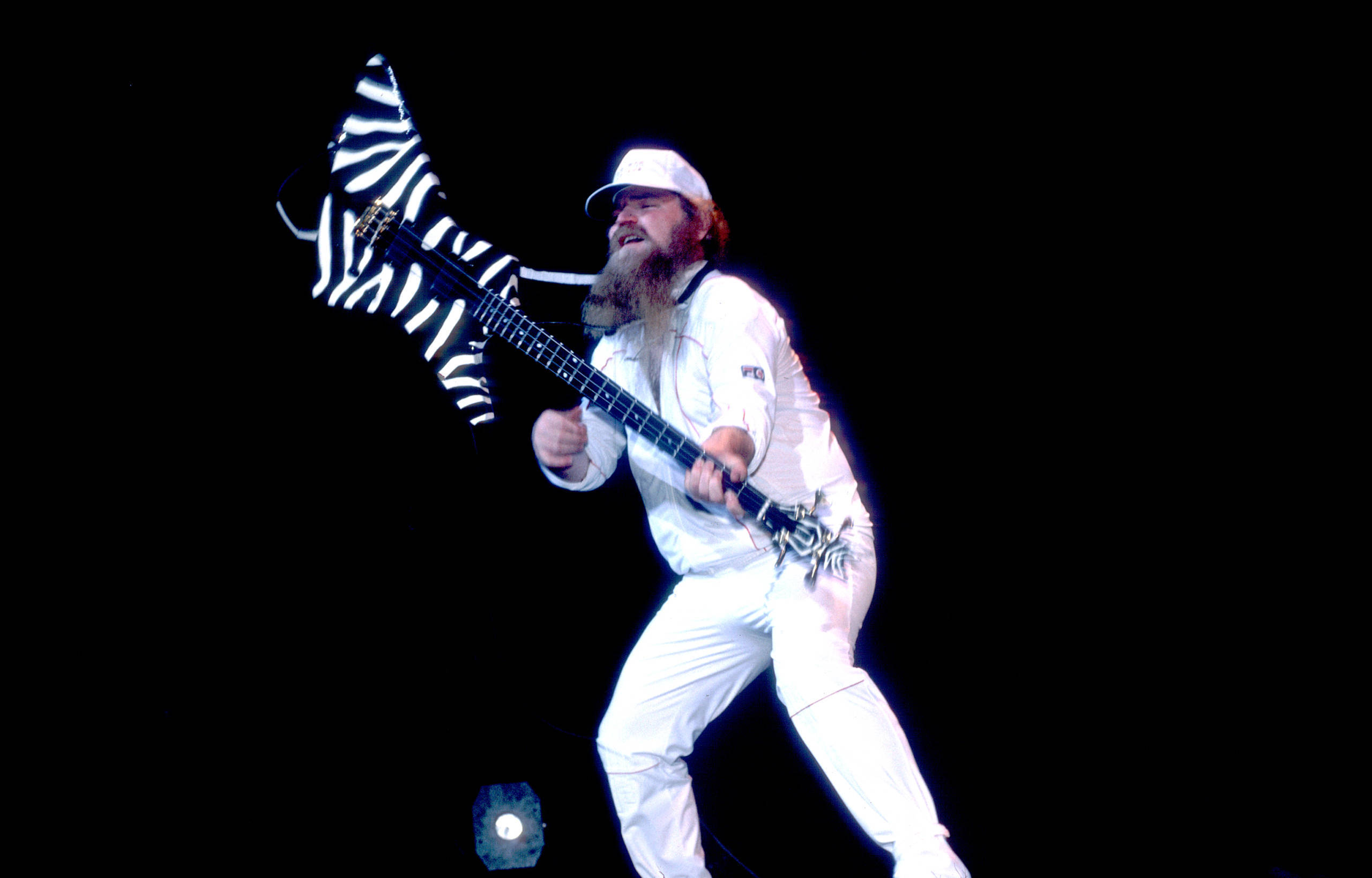 American Rock musician Dusty Hill, of the group ZZ Top, performs onstage at the Metro Center, Rockford, Illinois, February...