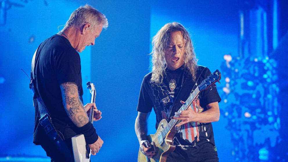 LOS ANGELES, CALIFORNIA - DECEMBER 16: (L-R) James Hetfield and Kirk Hammett of Metallica perform onstage as Metallica Presen