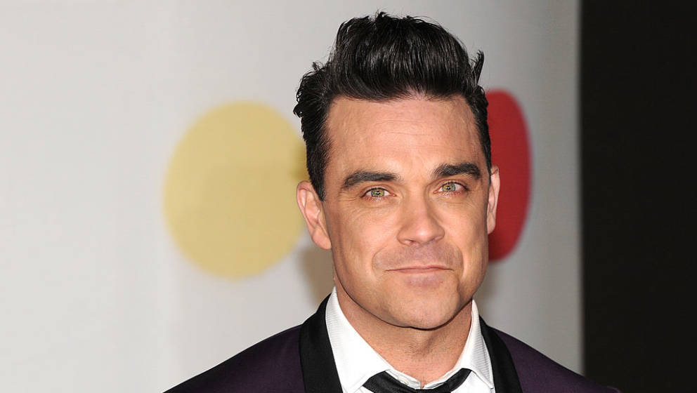 LONDON, ENGLAND - FEBRUARY 20:  Robbie Williams attends the Brit Awards 2013 at the 02 Arena on February 20, 2013 in London, 
