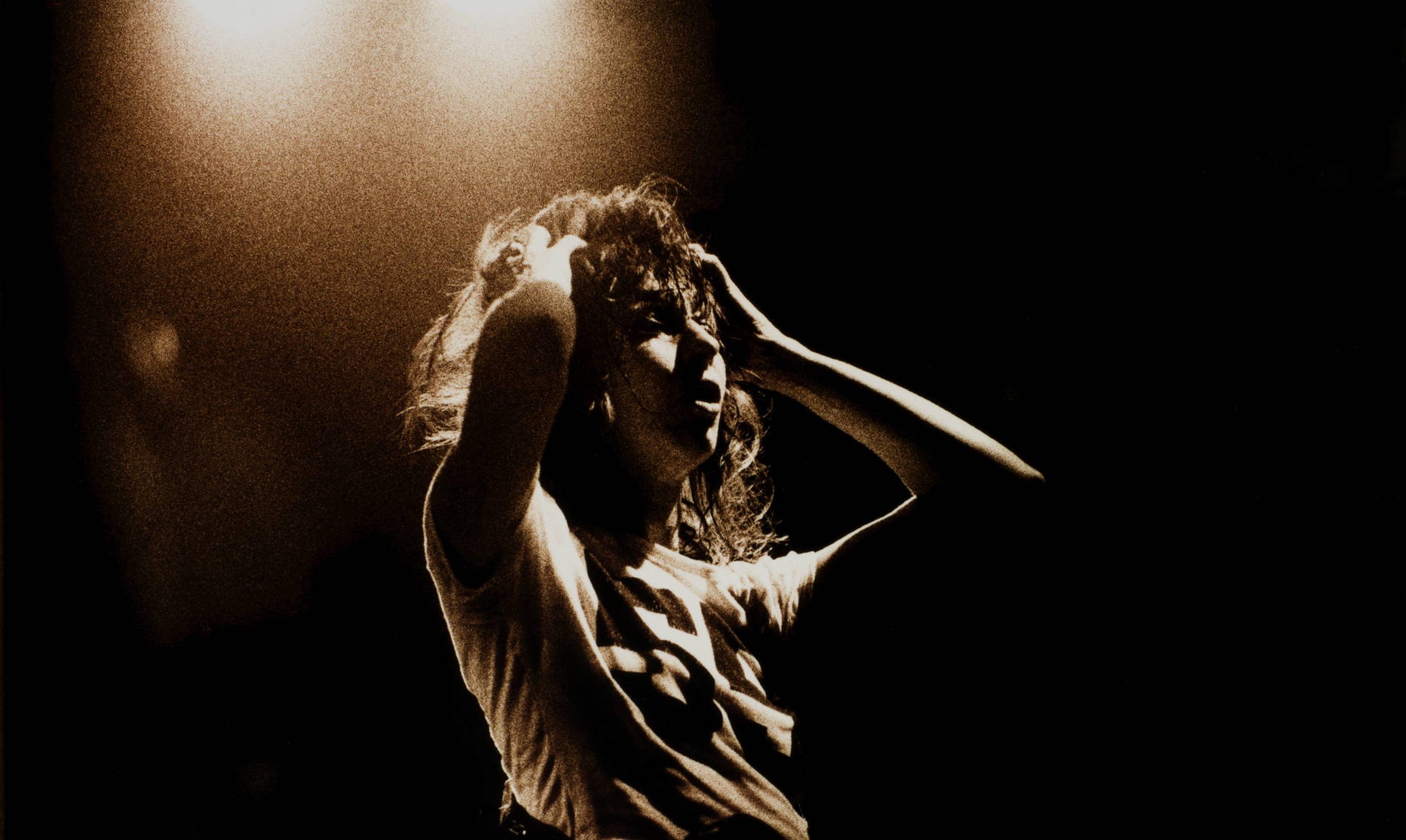 Chrissie Hynde, The Pretenders, performing on stage, Glastonbury Festival, United Kingdom, 24th June 1994. (Photo by Niels...