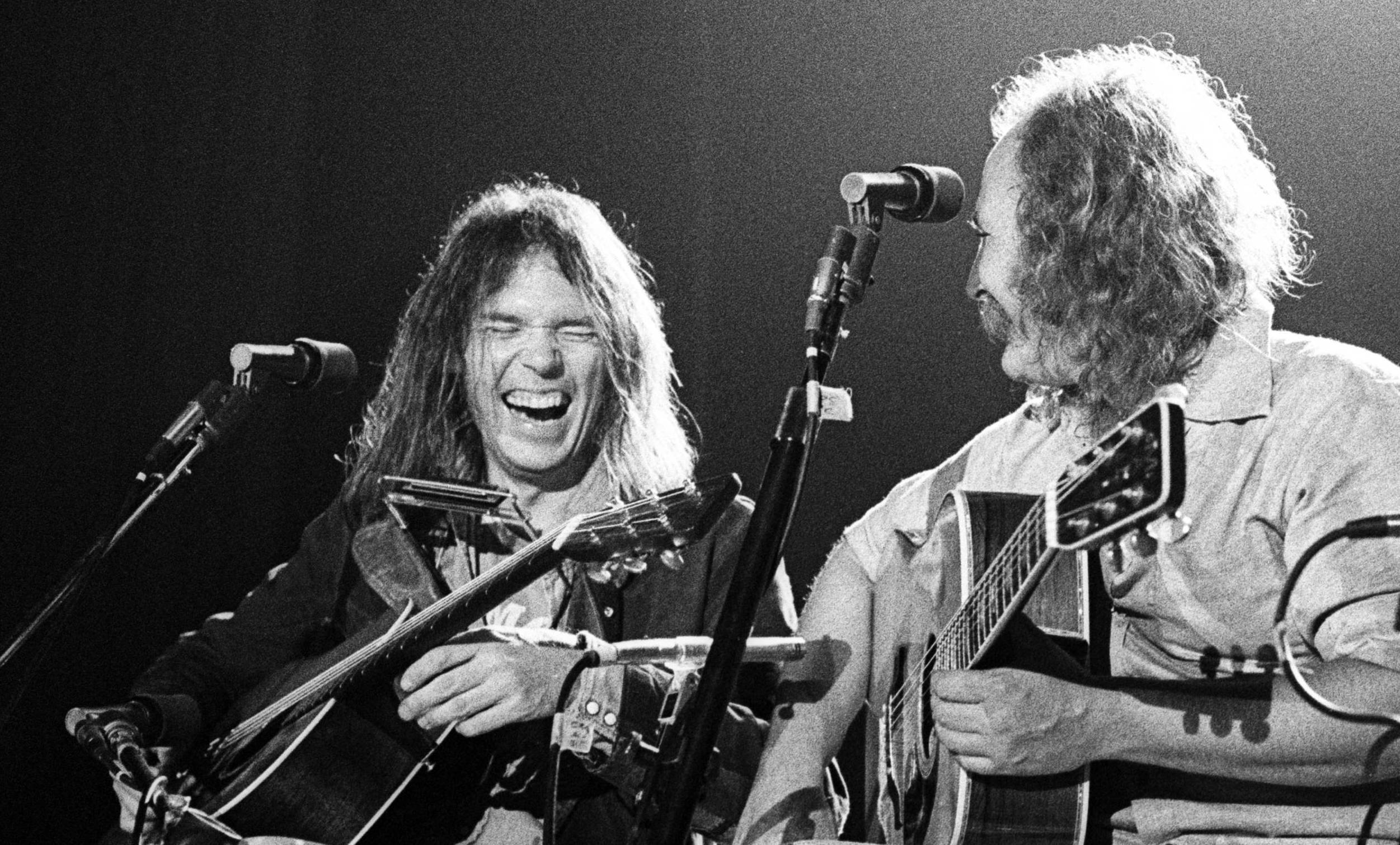 SANTA CRUZ, CA - AUGUST, 1977:  Neil Young performs with David Crosby and Graham Nash as their guest at the Santa Cruz Civ...