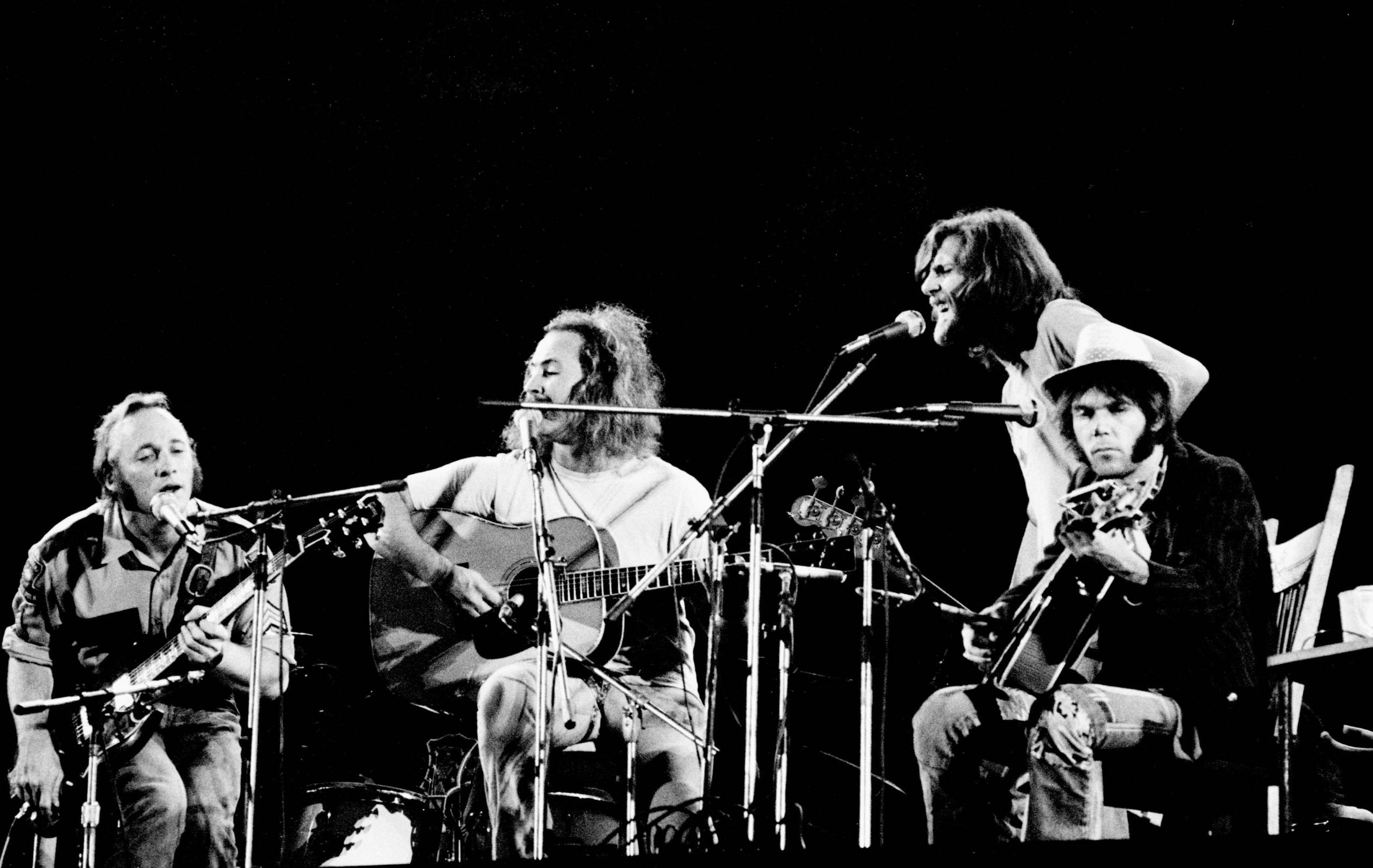 LONDON - SEPTEMBER 14: Crosby, Stills, Nash & Young perform live on stage at Wembley Stadium on September 14 1974 L-R Step...