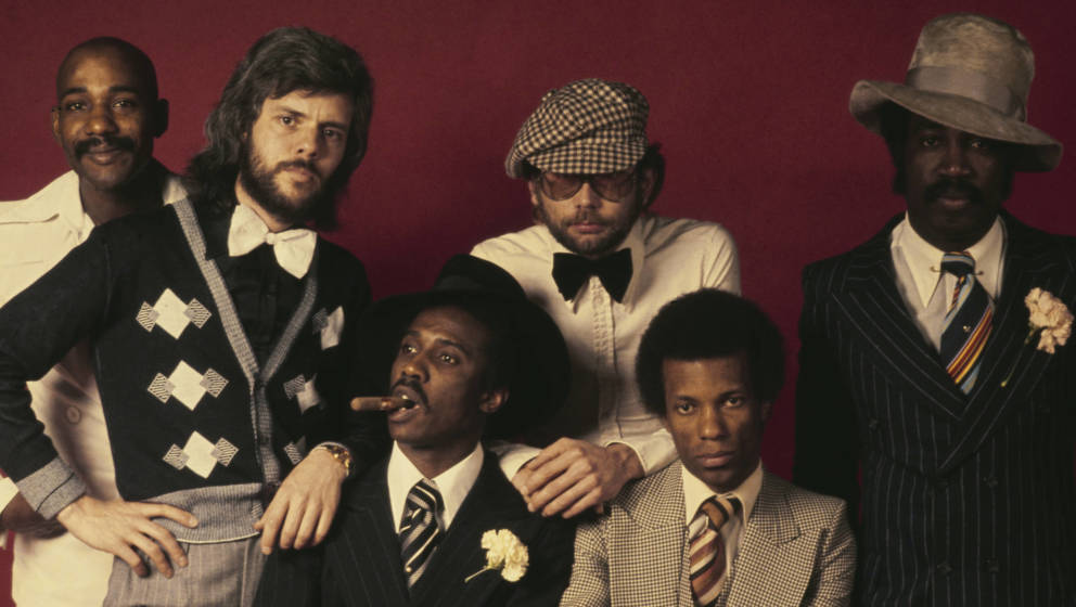 British pop group Hot Chocolate posed together in April 1974. Standing, left to right: singer-songwriter Errol Brown, guitari
