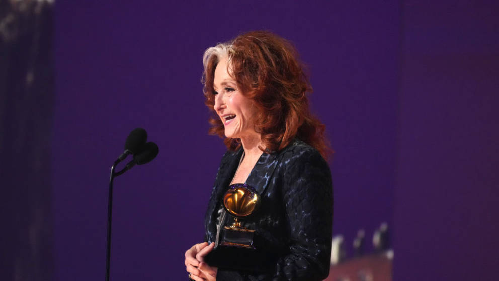 LOS ANGELES, CALIFORNIA - FEBRUARY 05: Bonnie Raitt accepts Song of the Year for “Just Like That” onstage during the 65th