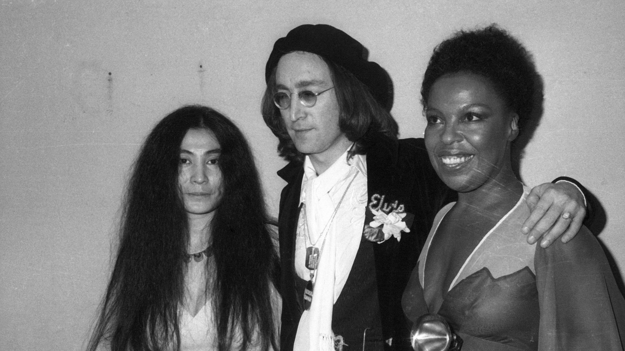 Japanese American musician Yoko Ono (left), her husband British musician John Lennon, and American musician Roberta Flack ...