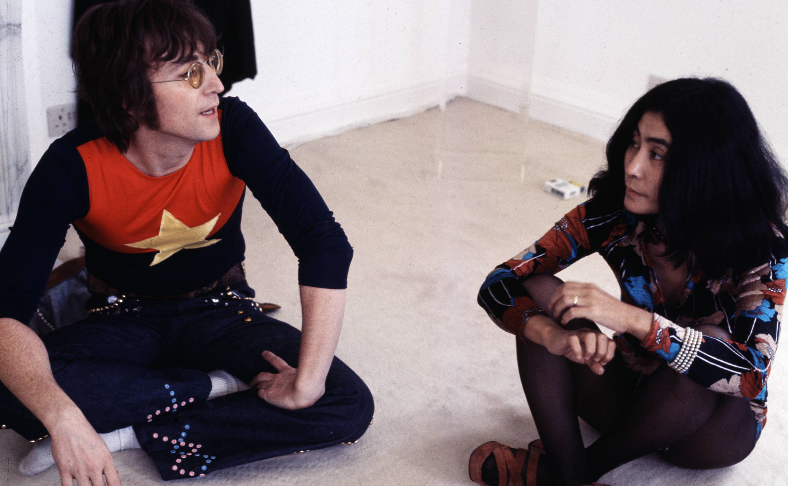 Former Beatle John Lennon (1940 - 1980) with his wife Yoko Ono at their home, Tittenhurst Park, near Ascot, Berkshire, Jul...